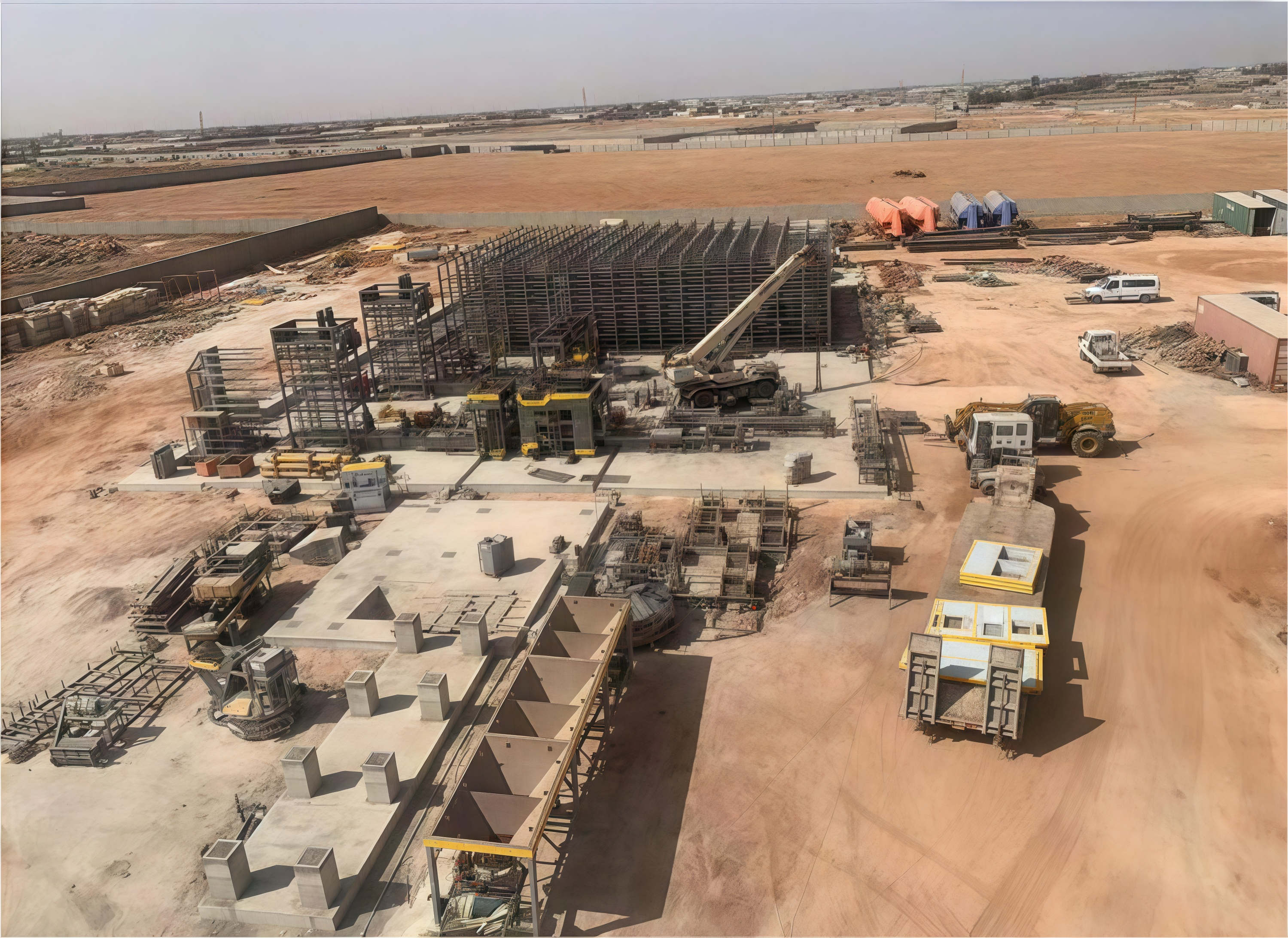 Qunfeng Machinery QS2000—a large-scale, fully automated concrete product production line commissioned in Libya. Qunfeng Machinery QS2000 – uma linha de produção de produtos de concreto totalmente automatizada e em grande escala encomendada na Líbia.
