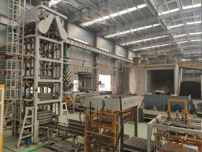 a linha de produção de blocos automáticos QS1500 em Taixing, na província de Jiangsu 